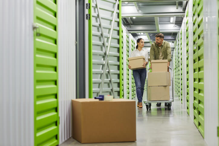 Couple Moving Into Storage Unit