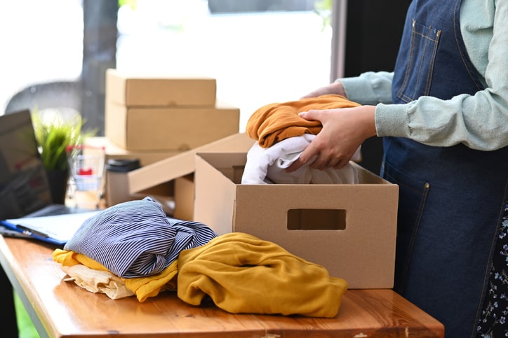 Putting Clothes In Boxes